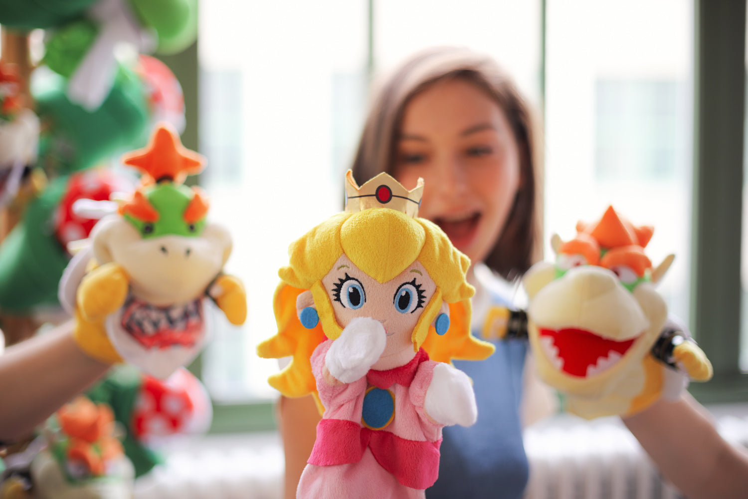 Licensed Super Mario hand puppets, by Uncute (from left to right: Bowser Jr., Princess Peach, and Bowser)